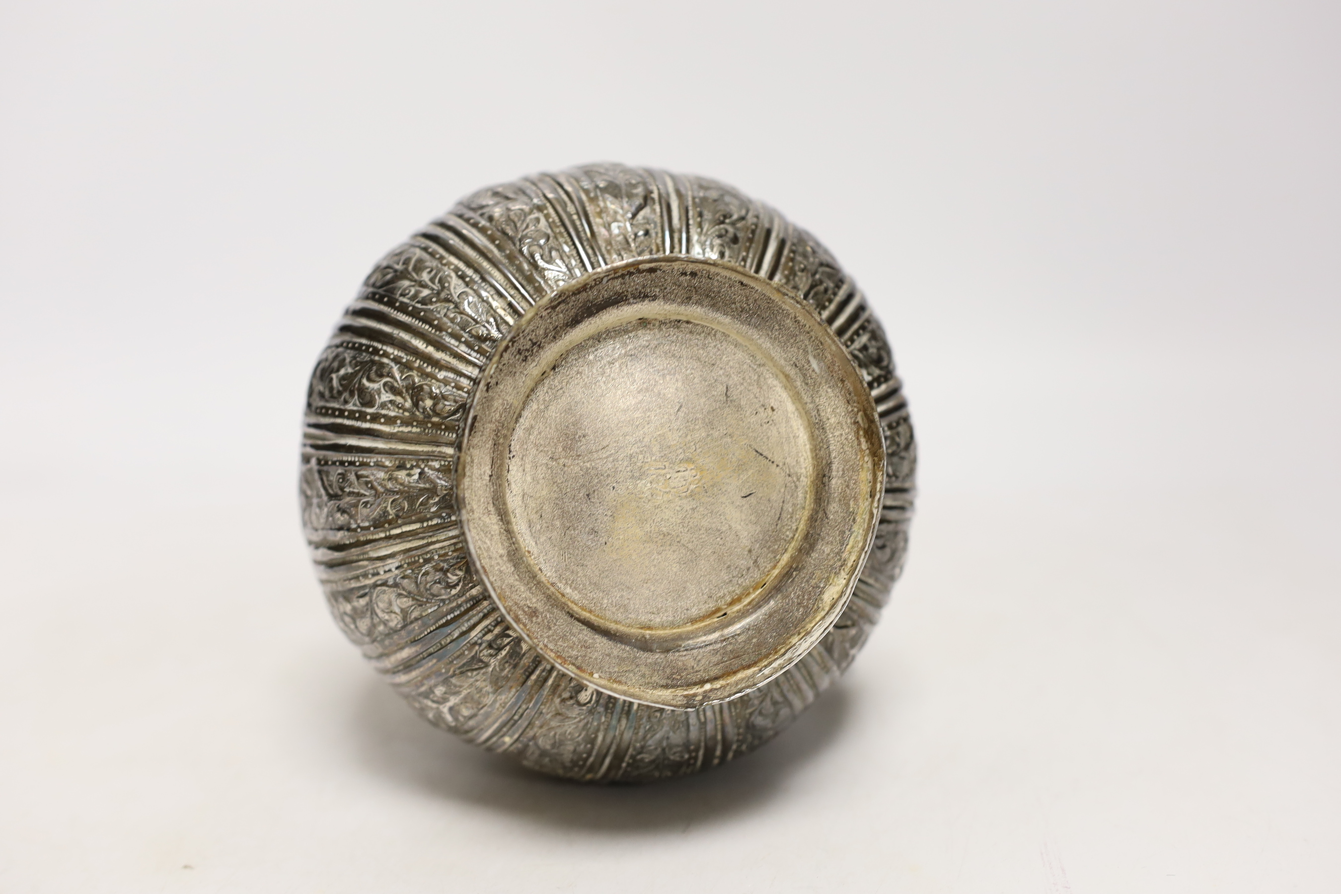 A Persian white metal vase, 25cm